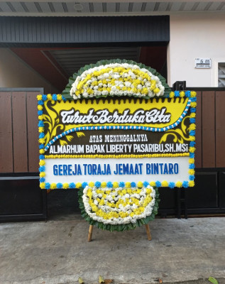 Papan Bunga Duka di Dujung Sakti